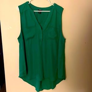 Green sleeveless shirt
